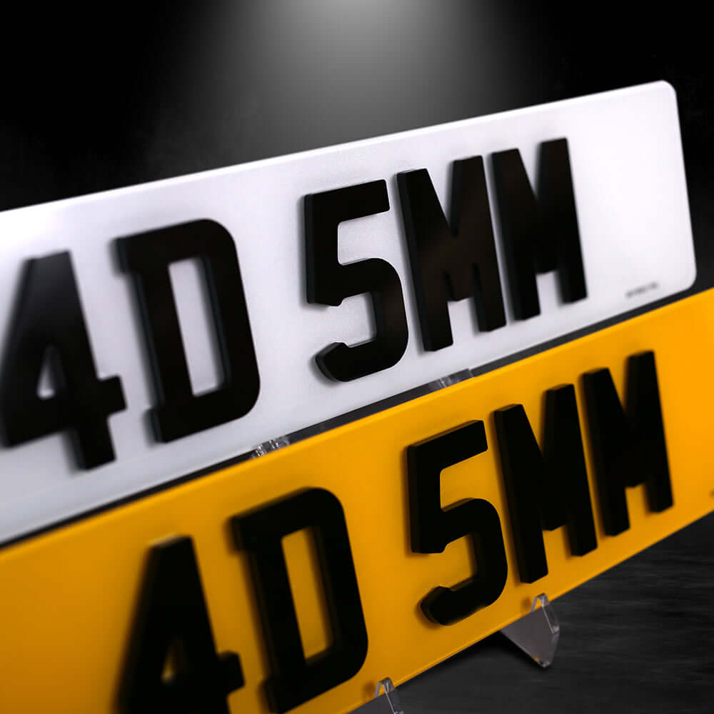 Pair of 4D 5mm car number plates in white and yellow, standard size, laser cut for added style.